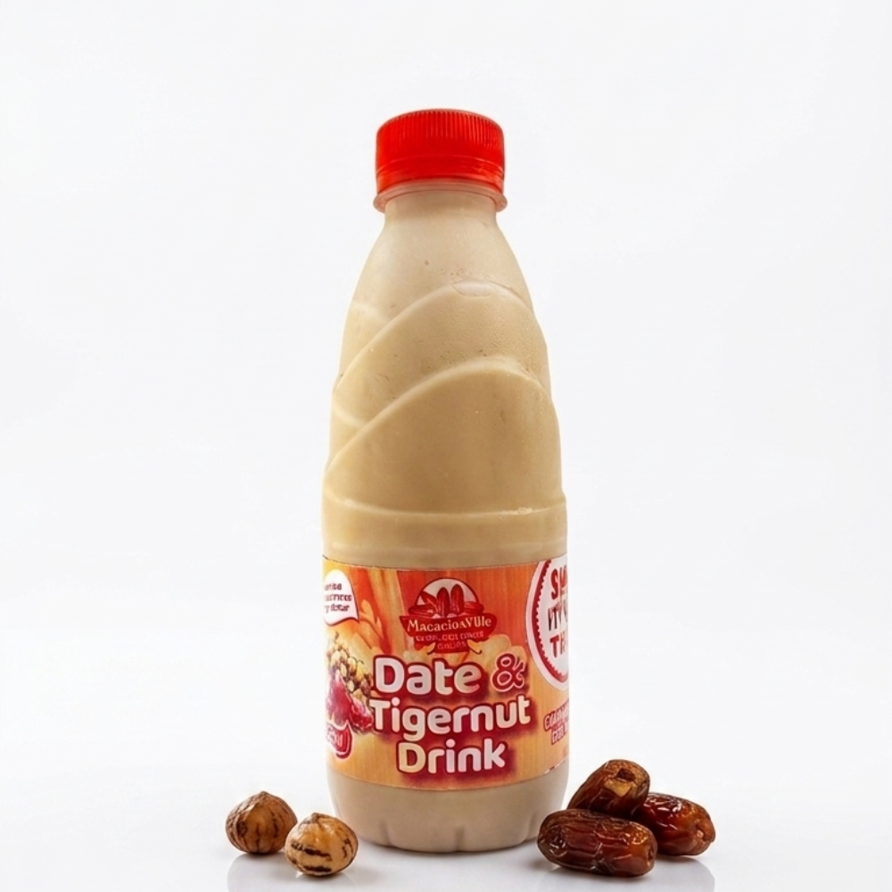 MacariusVille Date and Tigernut Drink in clear bottle with red cap, surrounded by fresh dates and tigernuts on reflective white surface — natural plant-based prebiotic beverage Nigeria